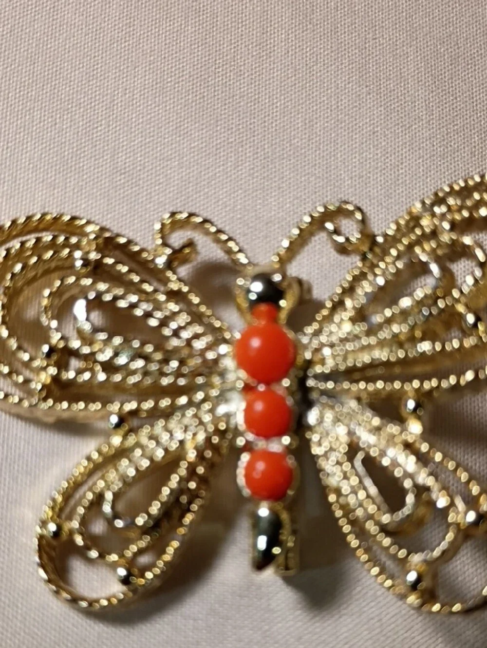 Gold-Tone Butterfly Brooch with Bright Orange Cabochons